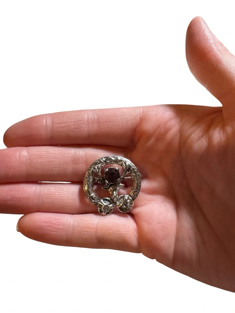 Vintage Silver-Tone Brooch with Deep Red Crystal Accent